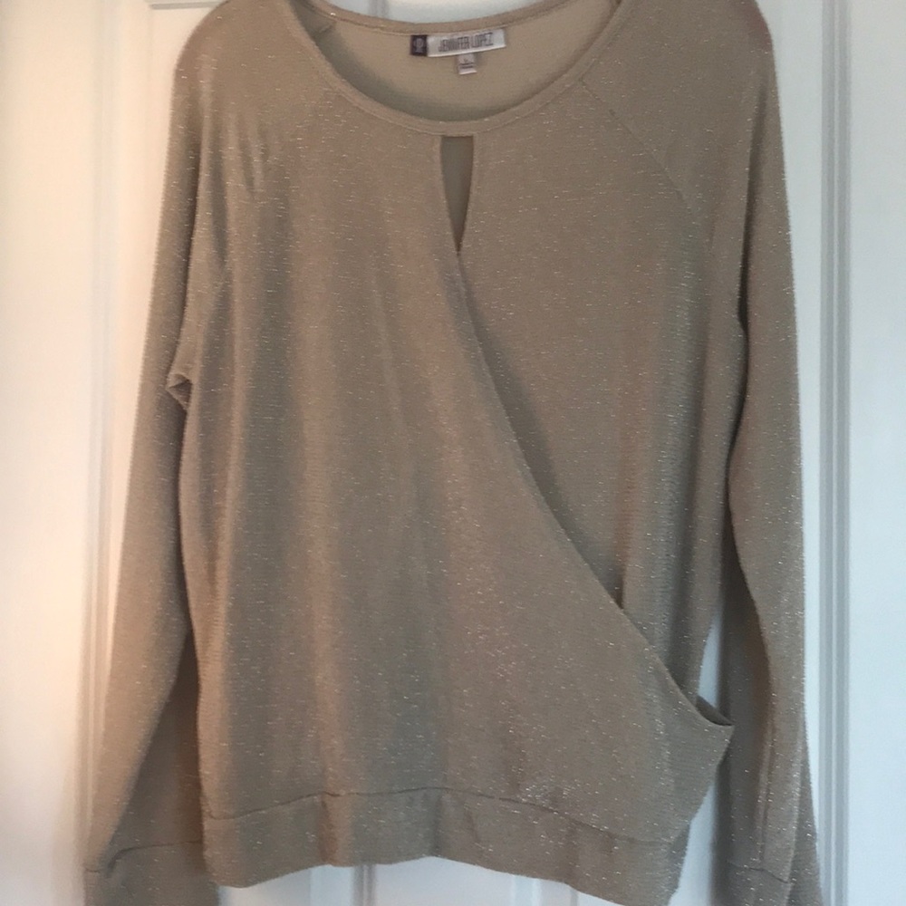 Jennifer Lopez tan with silver sparkles top L